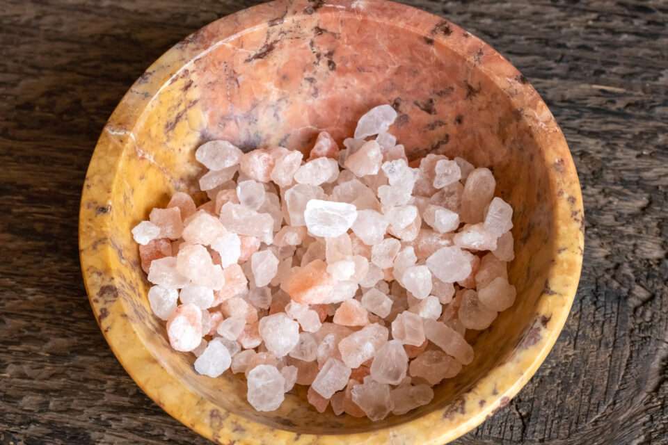 Rough pink Himalayan salt in a bowl